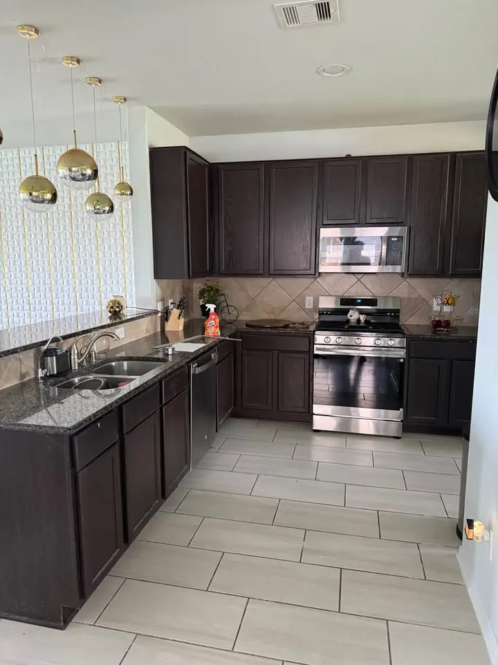 Kitchen before remodel — outdated cabinets and countertops, Palm Beach County